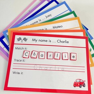 May include: Colorful educational name learning cards. The cards feature the text "My name is..." and include the name "Charlie" with matching, tracing, and writing activities. A red race car graphic is in the corner. Other names are also visible.