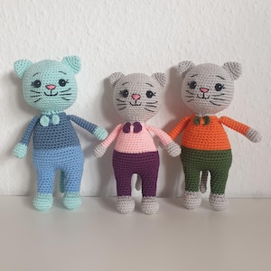 Crocheted cat doll – Amigurumi cat in colorful clothes – Crochet toy as a gift for children – Handmade soft toy