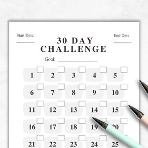 May include: A printable 30-day challenge tracker with blank boxes for each day of the month. The tracker has a title that says "30 Day Challenge" and space for a start date, end date, and goal.