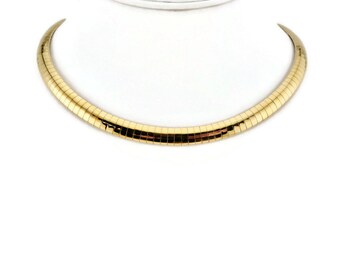 Gold tone Omega Choker Necklace.