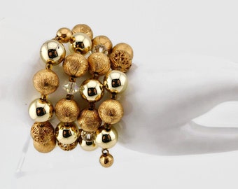 Vintage Gold tone  Metal Beads and Clear  AB Crystals Memory wire Bracelet.
