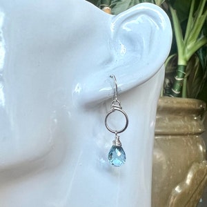 Sterling silver &quot;loopy&quot; drop earrings with genuine blue topaz