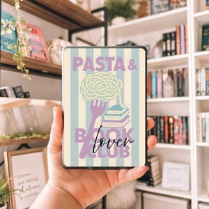 May include: A rectangular phone case with a pastel striped background. The case features the words "PASTA & BOOK LOVER CLUB" in lavender and black script. A graphic of spaghetti on a fork and stacked books is in the center.