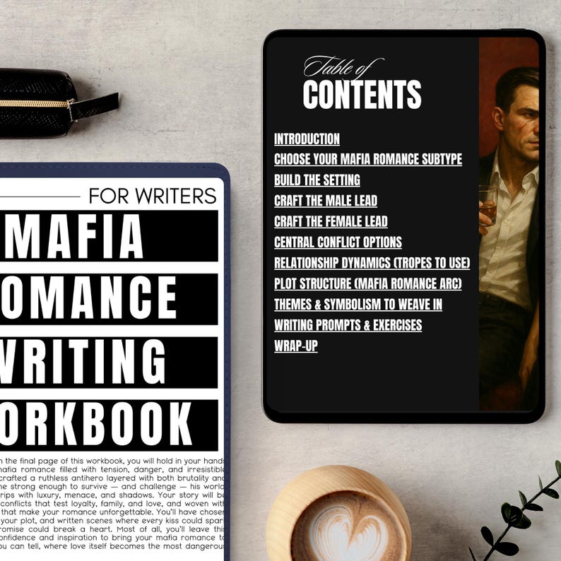 May include: A workbook titled "MAFIA ROMANCE WRITING WORKBOOK" with a black cover and white text. A digital tablet displays a "Table of Contents" for a mafia romance writing guide. A black leather case and a coffee cup are also visible.