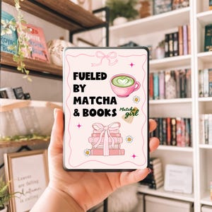 May include: A pink and black tablet case with the text "FUELED BY MATCHA & BOOKS" and a matcha latte illustration. The case also features a stack of books tied with a bow and the words "Matcha girl".