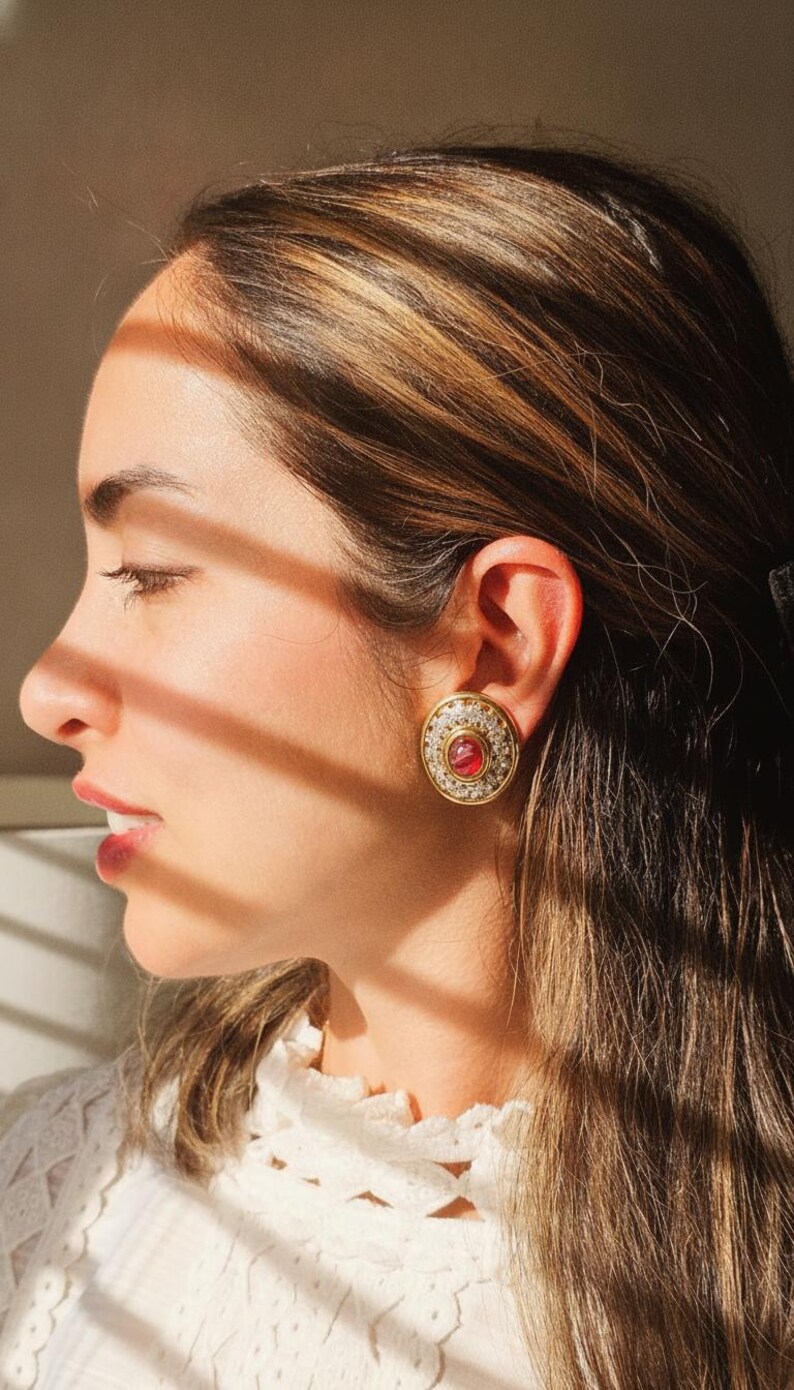 Vintage 1980s Unsigned Gold-Tone Round Clip Earrings | Ruby Red Glass Cabochon & Clear Pavé Rhinestone Halo | Glamour Button Clips image 3
