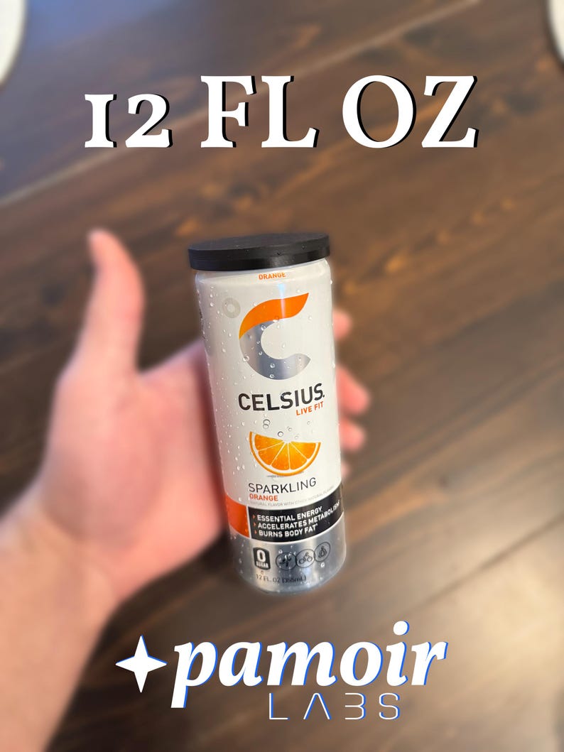 May include: A white and silver Celsius sparkling orange energy drink can with a black lid. The can features the text "CELSIUS LIVE FIT" and "SPARKLING ORANGE". The can is 12 fl oz.