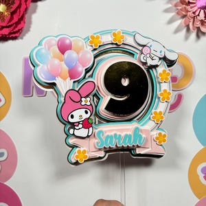 melody and cinnamon roll themed cake topper