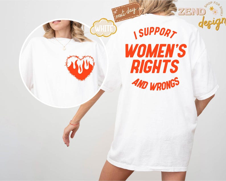 May include: White t-shirt with the text "I support women's rights and wrongs" in orange on the back. The front of the shirt has a red heart with flames inside and barbed wire around it.