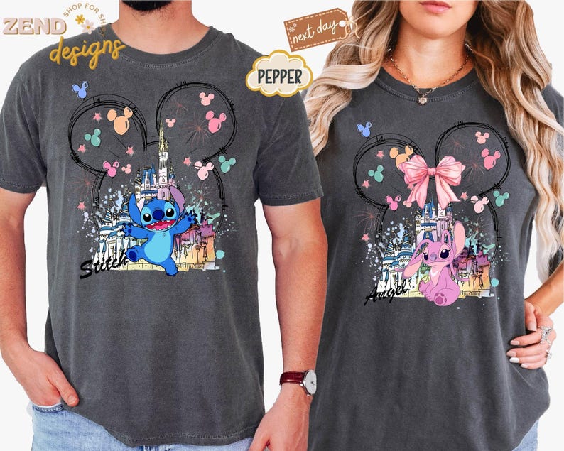 May include: Two charcoal gray t-shirts featuring Disney's Stitch and Angel characters. Each shirt has a castle graphic within a Mickey Mouse ear outline, with the character's name below. The Stitch shirt has blue accents, while the Angel shirt has pink.
