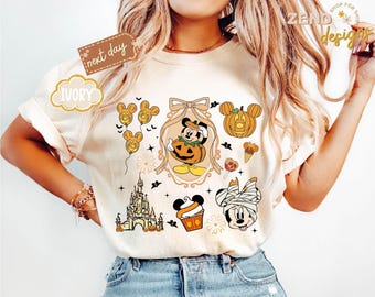 Camiseta Comfort Colors® "Tis the Season", camiseta de Halloween con el castillo de Disney y lazo coqueto, camiseta de otoño de Disney, camiseta de calabaza de Mickey, camiseta con vibraciones otoñales de Disney