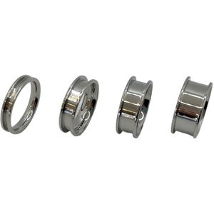 May include: Four silver metal rings of different sizes. The rings are smooth and have a polished finish.