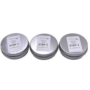 May include: Three silver metal containers with labels that read "Diamond Polishing Paste" and "Step 1", "Step 2", and "Step 3".