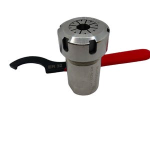 May include: A silver ER32 collet chuck with a black wrench and a red handle. The collet chuck has the text "ER32" and "RS-A COLLET" printed on it.