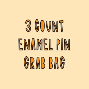 Peut inclure: Un graphique avec du texte orange sur un fond orange clair. Le texte indique "3 count enamel pin grab bag".