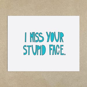 UITVERKOOP - I Miss Your Stupid Face - A2 gevouwen notitiekaart en envelop - Art.nr. 109,-