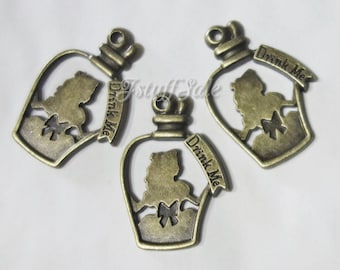 Alice in Wonderland theme Drink Me bottle charms - 3 pieces