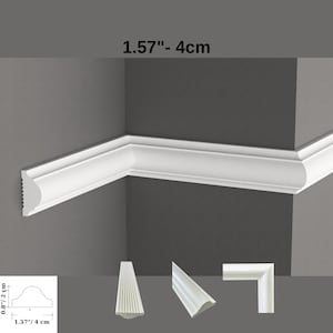 May include: A white decorative wall molding strip featuring a curved profile. The molding measures 1.57 inches in width and 0.8 inches in height. The image displays the molding installed on a corner, along with separate views showing its profile and corner angle.