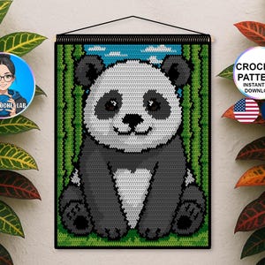 May include: Crocheted panda bear wall hanging with a black border, bamboo background, and blue sky with white clouds. The panda has black and white fur. The text "CROCHET PATTERN INSTANT PDF DOWNLOAD" is in the upper right corner.