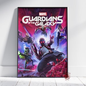 May include: A framed Marvel "Guardians of the Galaxy" poster. The artwork features the team in action, with Star-Lord in the foreground. The poster has a vibrant color palette of pink, purple, and blue, with the title prominently displayed.