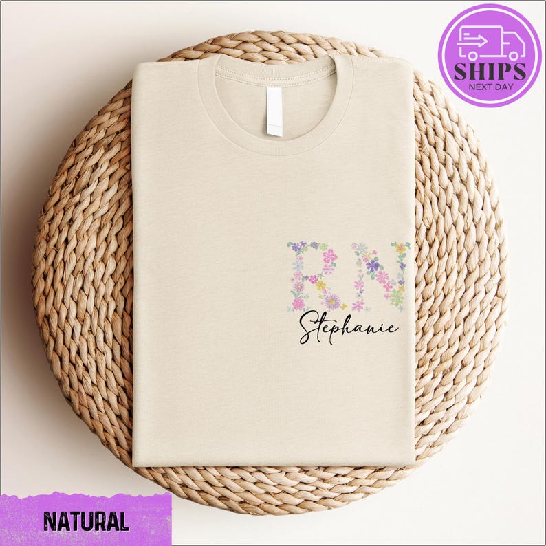 a white t - shirt with a floral design on it