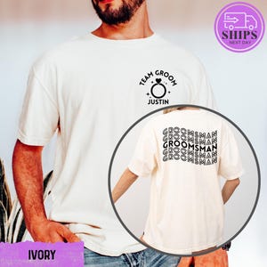 a man wearing a t - shirt with a picture of a man's face