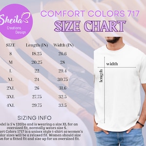a man wearing a white t - shirt with a size chart