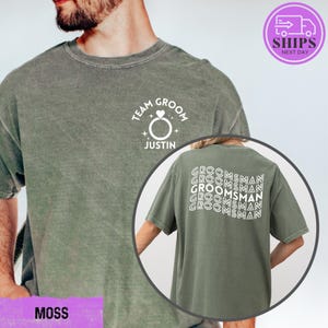 a man with a beard wearing a green shirt