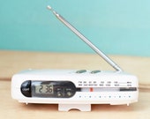 Cosmo Travel Clock Am-FM Radio Cute and Compact White Cosmo Portable Radio with Alarm Clock With Leather Case Instructions Works