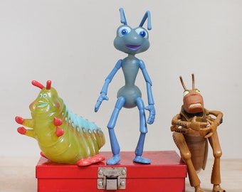 Set of 3 A Bug's Life Pixar Film Figures; Flik, Heimlich and Hopper Marked and Dated 1998/ Cute 1990s Animation Colliectables