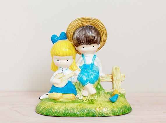 Joan Walsh Anglund Cuties/ Sweet Ceramic Pair on a Fence With