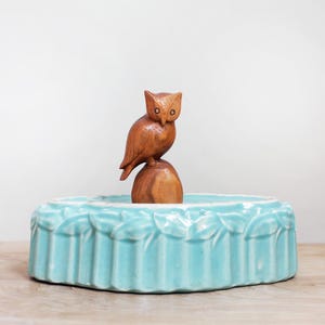 May include: A rustic wooden sign with the text "Welcome" in a handwritten style. The sign is painted white with a distressed finish, and features a simple, elegant design. Perfect for a front door or entryway.