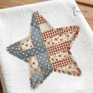 May include: A star-shaped fabric ornament featuring a patchwork design with blue polka dot, cream floral, and red gingham patterns. The edges are finished with a frayed fringe, and the pieces are joined together with visible zigzag stitching.
