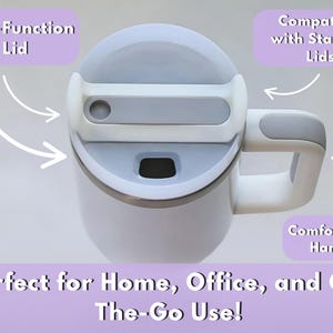 May include: White travel mug with a dual-function lid and comfort grip handle. The mug is compatible with Stanley lids. The text on the image says "Perfect for Home, Office, and On-The-Go Use!"
