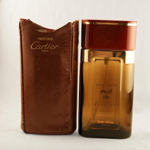 Frasco de perfume vintage vacío Cartier Must de 50 ml con estuche de piel burdeos marrón