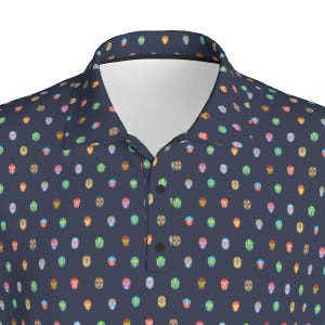 May include: A navy blue polo shirt with a repeating pattern of colorful luchador masks.