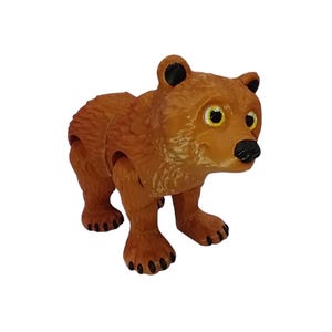 Estatueta articulada impressa em 3D de urso pardo