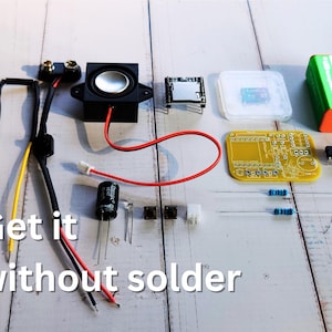 Electronics components for a DIY project neatly laid out on a wooden surface, including a speaker, battery clip, microcontroller, resistors, capacitors, a yellow PCB, push button, jumper wires, MOSFETs, and a 9V battery. Overlaid text reads 'Get it without solder'.
