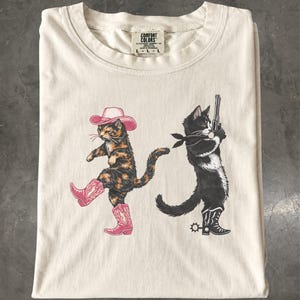 Western Cats T-Shirt: Cowgirl Tortoiseshell Cat and Cowboy Tuxedo Cat Graphic Tee