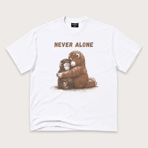 Never Alone T-Shirt: Whimsical Animal Hug Graphic Tee, Friendship Shirt, Support Gift
