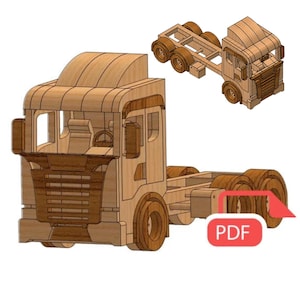 Op de afbeelding: Houten modelbouwpakket van een vrachtwagen met cabine en trailer. Het model is ongemonteerd en wordt geleverd met instructies. PDF.