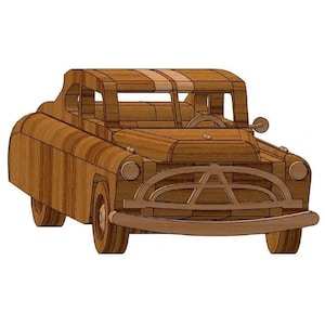 May include: A wooden model of a classic car, featuring a detailed design with visible wood grain. The car has a rounded body, prominent headlights, and a distinctive front grille. The model includes a steering wheel and side mirror.
