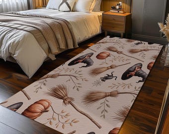 May include: A rectangular beige rug with a Halloween-themed pattern. The design includes illustrations of witch hats, pumpkins, brooms, black cats, and spiderwebs. The rug is placed in a bedroom setting.
