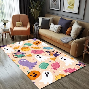 May include: A rectangular Halloween-themed rug featuring cartoon ghosts, pumpkins, candy, and witches on a light orange background. The rug is decorated with various Halloween elements in bright colors.