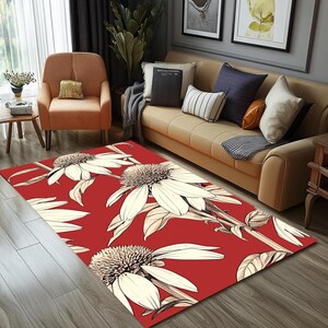 Könnte beinhalten: Roter Teppich mit weißem Blumenmuster. Der Teppich zeigt ein sich wiederholendes Muster aus weißen Blumen mit braunen Stielen und Blättern auf rotem Hintergrund.