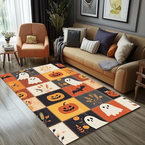 May include: A Halloween-themed area rug with a patchwork design. The rug features squares with pumpkins, ghosts, bats, and floral elements in orange, black, cream, and gray. The rug is rectangular and placed on a wooden floor.
