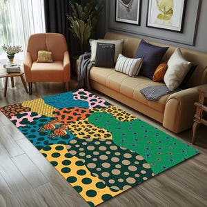 May include: A colorful area rug with a patchwork design. The rug features various patterns, including polka dots, leopard print, and floral designs, in shades of green, yellow, orange, and blue. Two butterfly illustrations are also included.