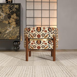 a modern living room with a round, patterned chair in the center, a large wall with a decorative panel, and a rug on the floor.