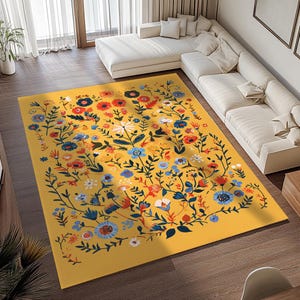 May include: A yellow rug with a floral pattern featuring blue, red, and green flowers. The rug has a vintage style and is perfect for adding a touch of color to any room.