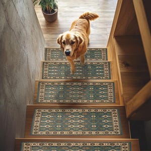 May include: A golden retriever walks down a wooden staircase with teal and beige patterned stair treads. The treads have a geometric design and are bordered by a beige trim. The stairs are in a well-lit, modern home.